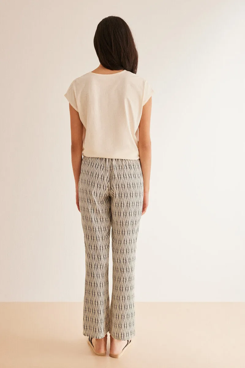 All-over ethnic print viscose trousers