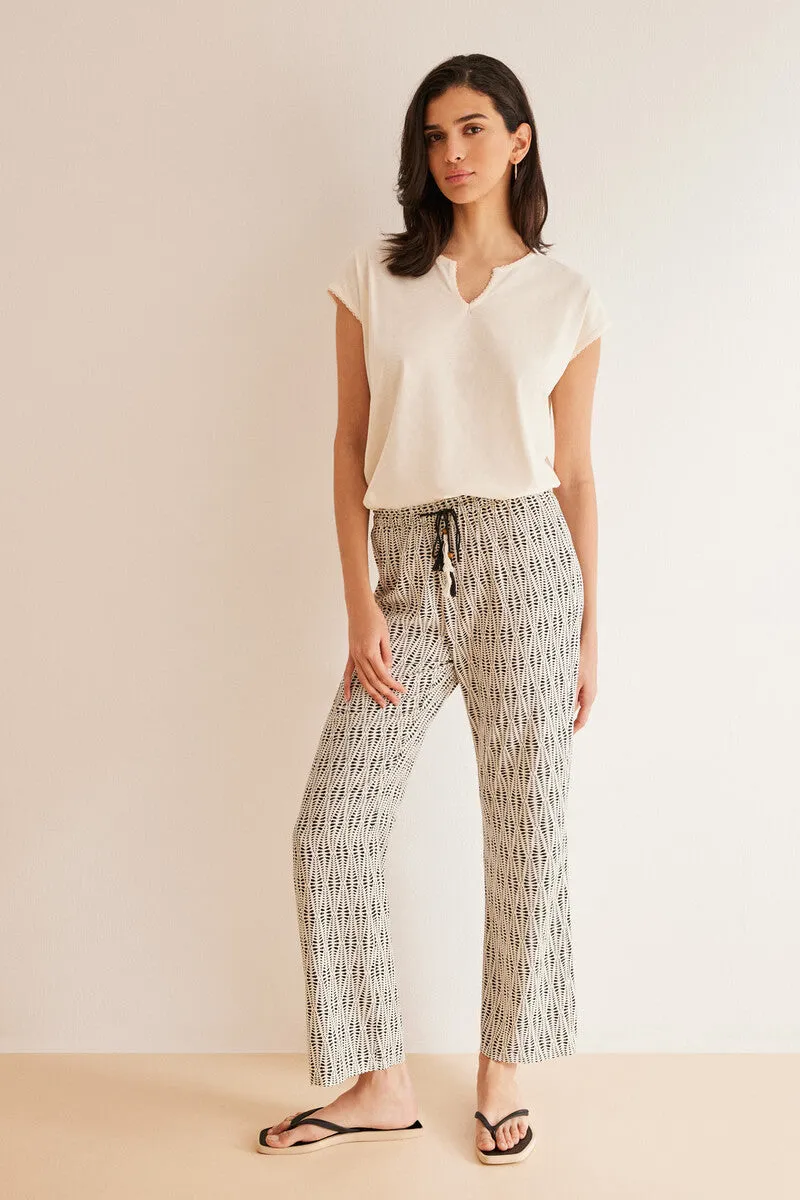 All-over ethnic print viscose trousers