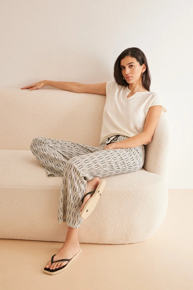 All-over ethnic print viscose trousers